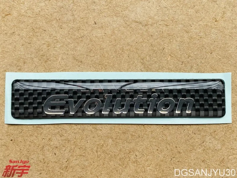 LANCER EVOLUTION IX EVO9 CT9A PLATE,FLOOR CONSOLE (LANCER EVOLUTION MARK LOGO 8011A251 GENUINE