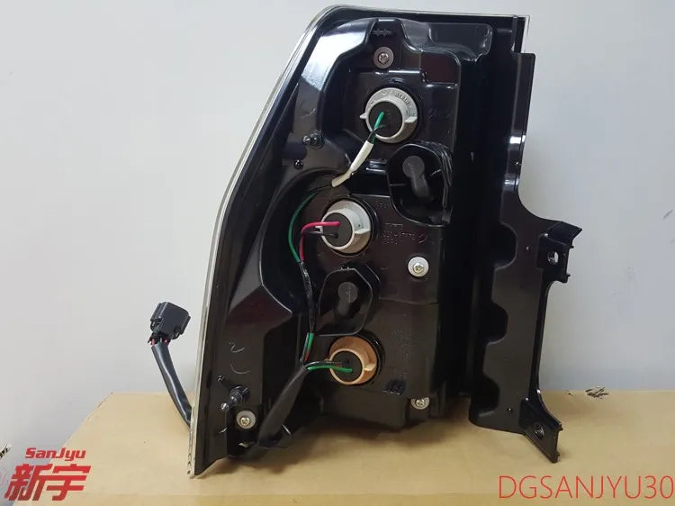 PAJERO4 MK4 V90W LAMP ASSY,COMBINATION,REAR GENUINE 8330A566 8330A565