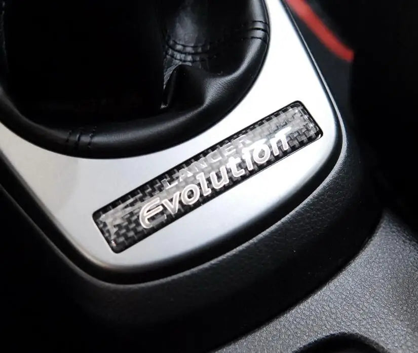 LANCER EVOLUTION IX EVO9 CT9A PLATE,FLOOR CONSOLE (LANCER EVOLUTION MARK LOGO 8011A251 GENUINE